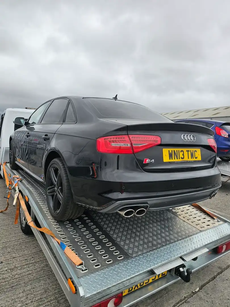 car recovery Wellingborough flatbed truck loading broken down vehicle on A45 near Corby
