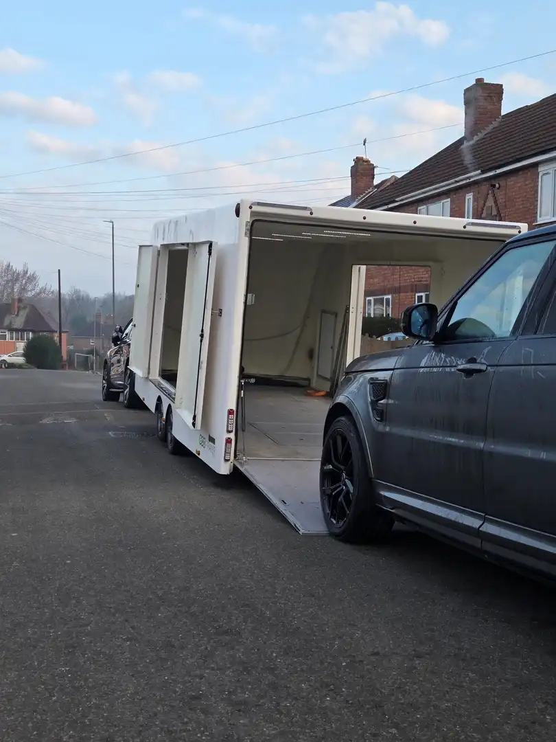Nick Recovery flatbed truck transporting a classic car from Corby to London